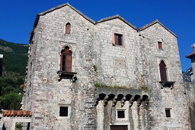 Bike tour - Kotor Bay circle and visit Our Lady of the Rock - Perast, coffee, and the island of Our Lady of the Rocks