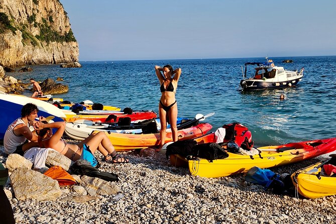 Budva Bay: Kayak & SUP Tour to Coastal Caves - Entering Pigeon Cave by kayak