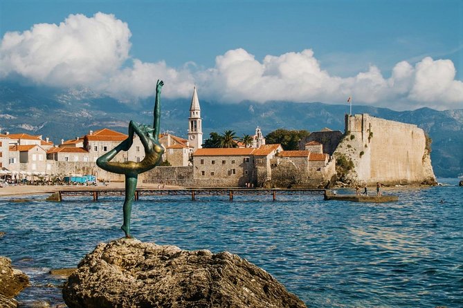 Budva City Tour - The main square and its unusual cluster of churches