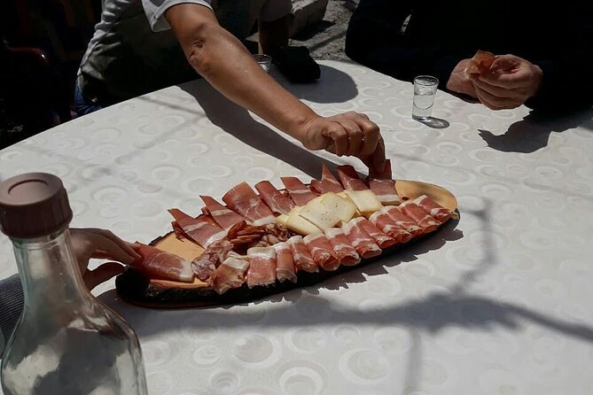Cable car ride, food tasting in Njegusi and Kotor Old Town - Njeguši: homemade food at a family home