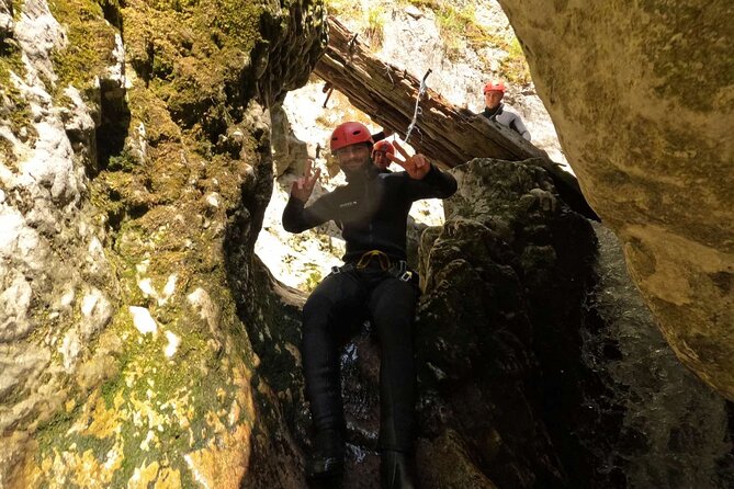 Explore the Thrills of Nevidio Canyon: 4 hour Canyoning Adventure - Rappelling, jumps, slides, and swimming
