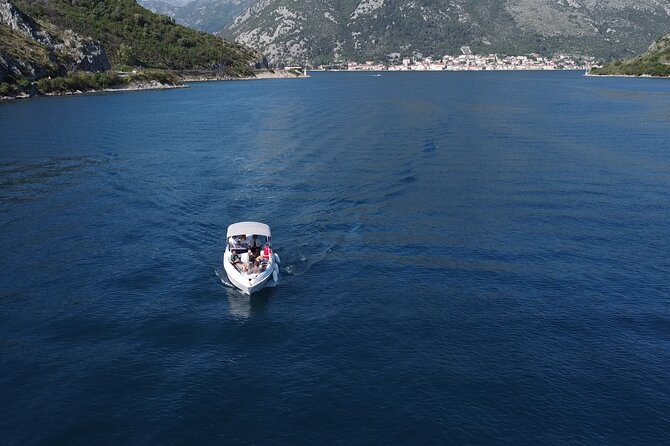 Kotor: Boka Bay Grand Explorer: 6.5-Hour Private Speedboat Tour - Cliff jumping and snorkeling at Galebova Plaza