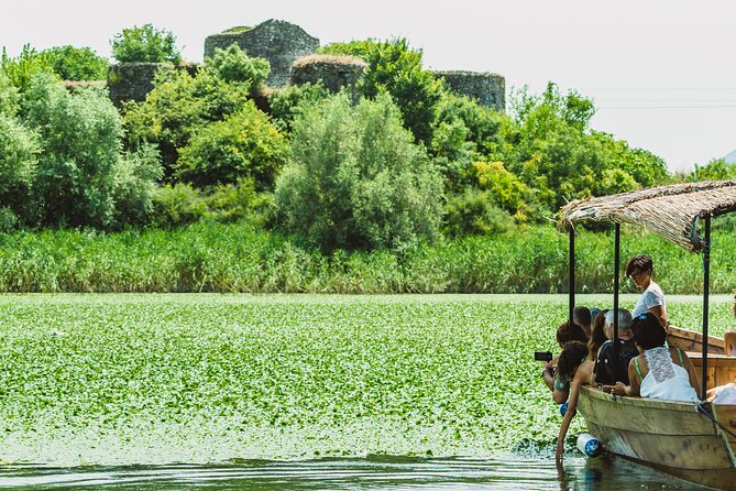 Skadar Lake National Park Guided Boat Tour with Wooden Boat - Wine, juice, and the quiet ride back